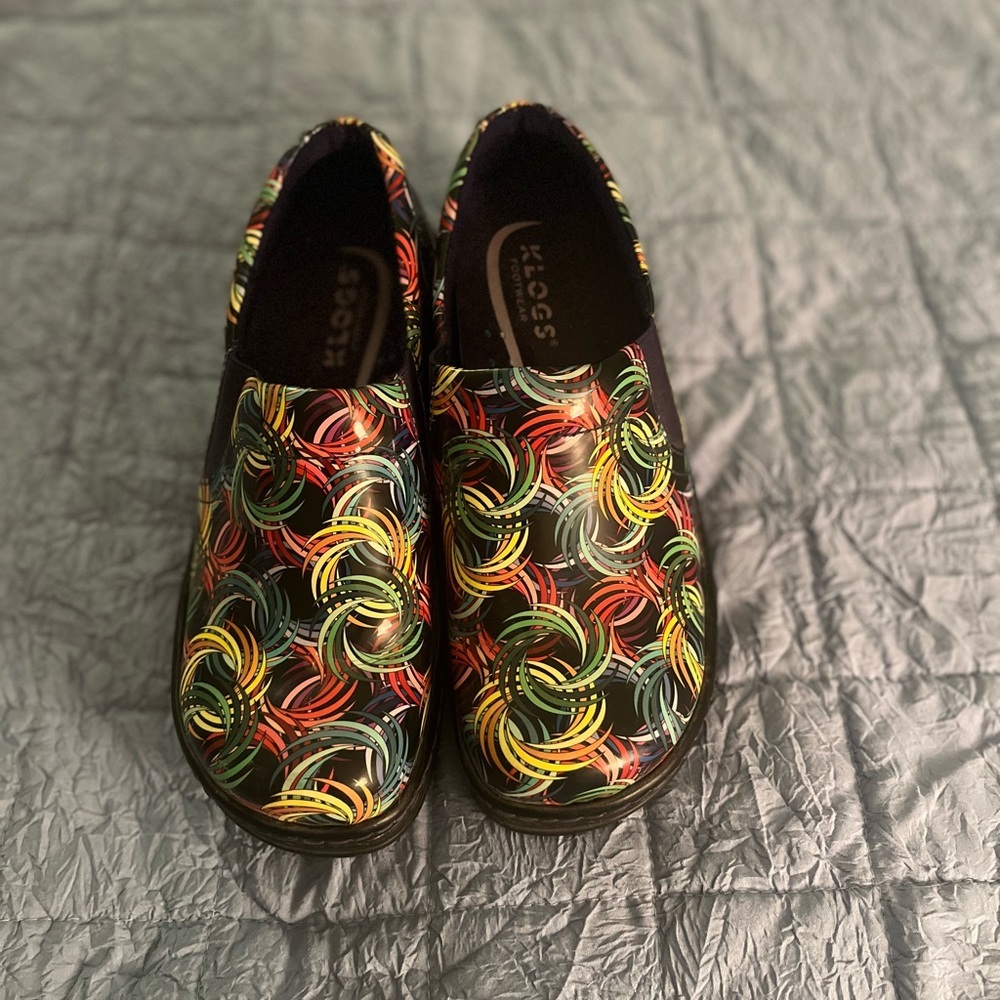 Klogs Multi color clog.  Great condition women’s 7.5 wide
